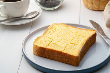 Bread Sliced With Butter On White Plate