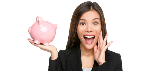 Woman holding piggy bank screaming and shouting excited and funny. Savings and banking with happy...
