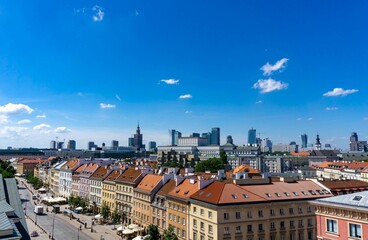 Fototapeta na wymiar View of the Warsaw city skyline with a blue sky.