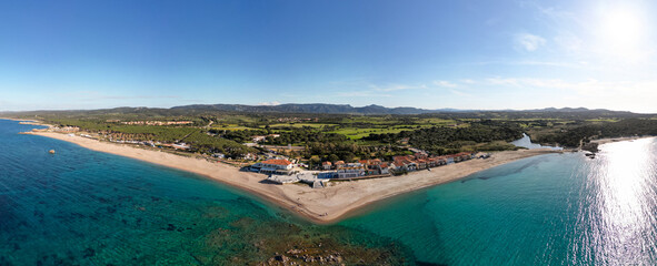Fototapeta premium Vignola Mare beach Panorama landscape photo in Aglientu Town, Sardini, Italy