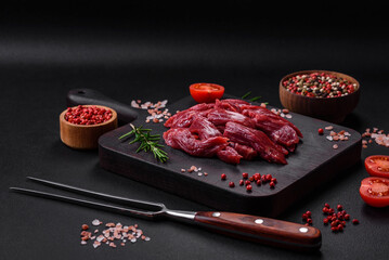 Fresh raw beef with salt, spices and herbs