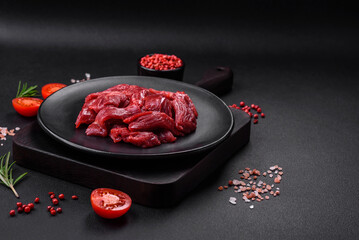 Fresh raw beef with salt, spices and herbs