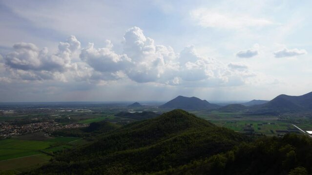 Moody fast moving cloud timelapse over the Euganean Hills regional park shot from Mount Ceva's trail