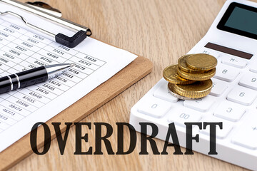 OVERDRAFT text with chart and calculator and coins , business concept