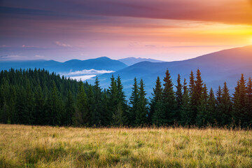 Utterly spectacular view of the sunset over the mountain ranges. Carpathian mountains, Ukraine.