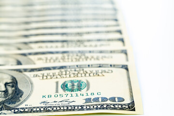 One hundred dollars banknotes closeup on the background - 590900716