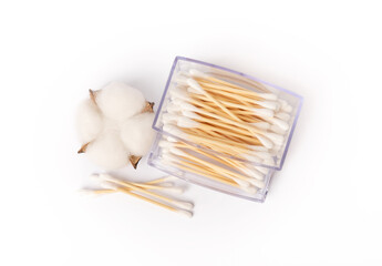 Cotton swabs in holder isolated on white background. Bamboo cotton buds. Means for hygiene of ears. Eco friendly materials.