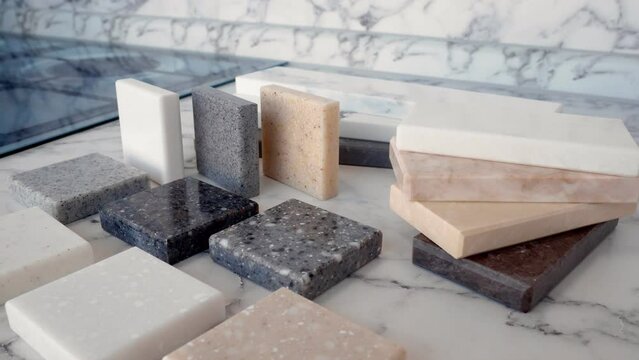 Sample of artificial acrylic stone for kitchen countertops and other furniture. Stone texture for modern interior design