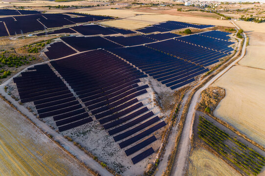 Elevated view of the solar power station with solar panels at sunset in Spain, Renewable Energy, Solar Energy, Saelices, Cuenca, Castilla La Mancha, Spain