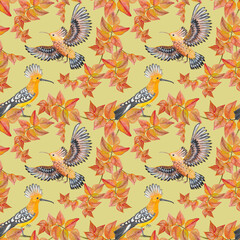 Seamless pattern with watercolor birds on a yellow background. © qwertfak