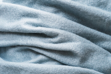 Fototapeta na wymiar closeup of soft felt material in blue color