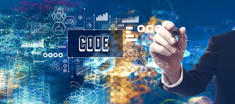 Code theme with businessman in a bokeh neon light trails city night background