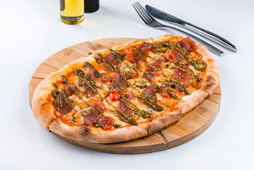 Italian pinsa with bresaola, cherry tomatoes, jalapeno, cheese and sauce. - 590915718