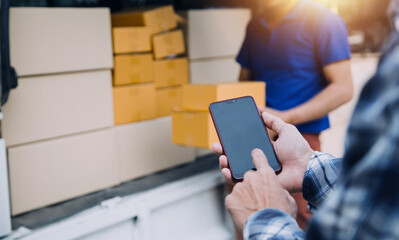 Startup small business entrepreneur of freelance Asian woman using a laptop with box Cheerful success Asian woman her hand lifts up online marketing packaging box and delivery SME idea concept