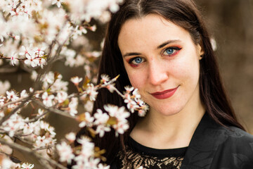 unaltered imagery skincare dermatology beauty. Hispanic woman portrait with cherry blossom