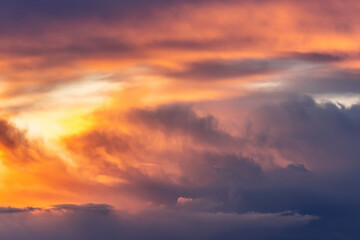 Fototapeta na wymiar Beautiful storm cumulus clouds in the sky during sunrise or sunset, background