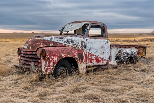 A vintage half ton pickup truck abandoned on the Saskatchewan prairies