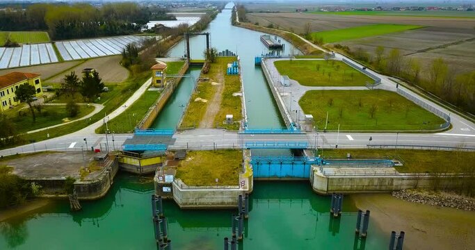 A river dam with two passages for ships