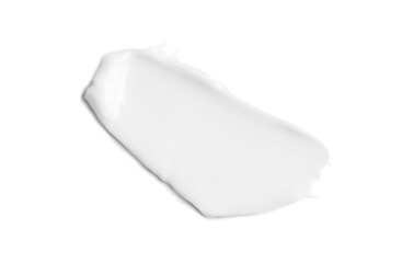 White cream smear, isolated on white background. Moisturizer, facial, hands or body cream, beauty product texture, smudge. 
