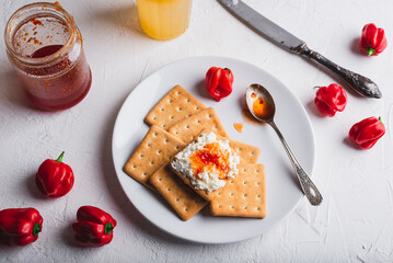 Crackers with Cream Cheese and Hot Pepper Jam