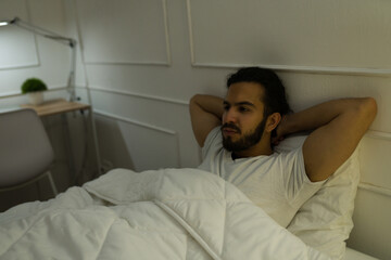 Attractive young man suffering from insomnia