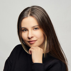 Portrait of a charismatic young brunette girl close-up.