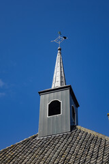Stolphoeve church (Stolphoevekerk), old protestant church is one of the 3 national monuments in beautiful small fisherman town. VOLENDAM, the NETHERLANDS.