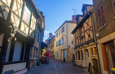 Fototapeta premium Vintage houses along street of Monlucon, Auvergne-Rhone-Alpes, Allier, France.