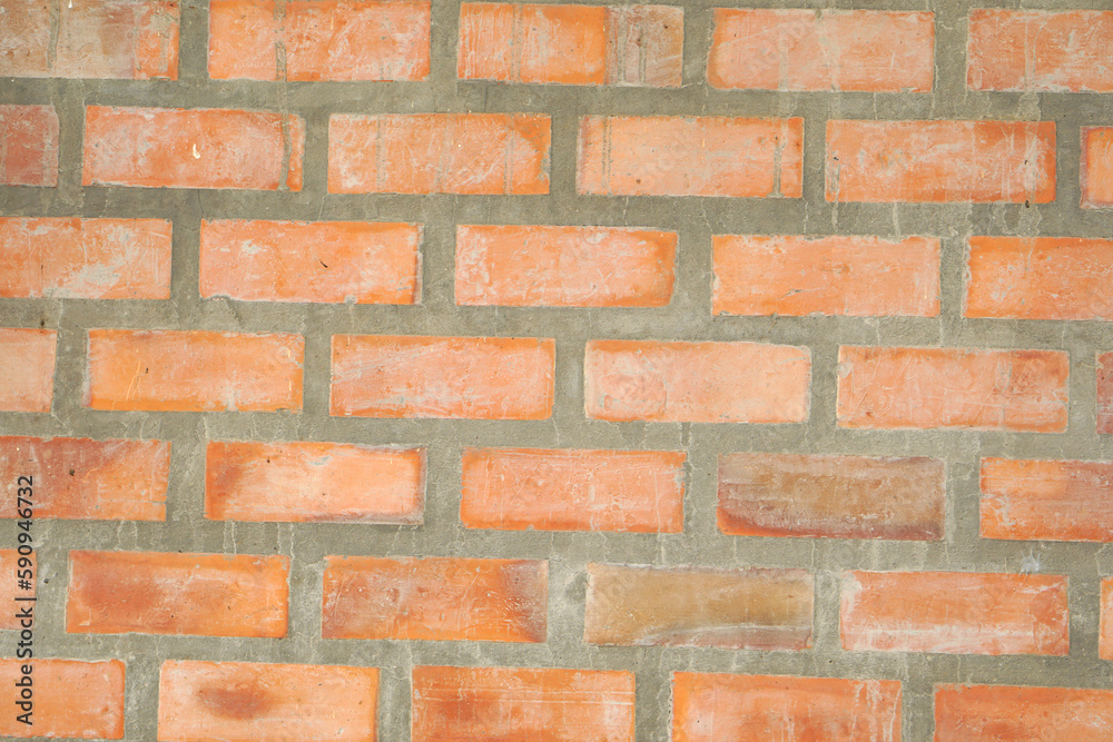 Wall mural Brown block brick wall background, building wall