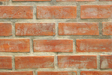 Brown block brick wall background, building wall