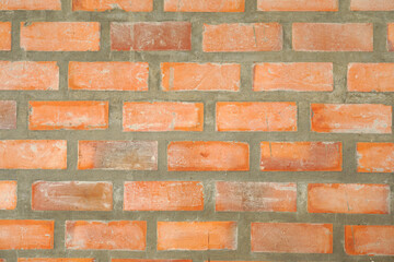 Brown block brick wall background, building wall
