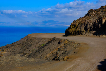 Curved road and view on the ocean on Cofete beach on Fuerteventura, Spain - Canary Islands