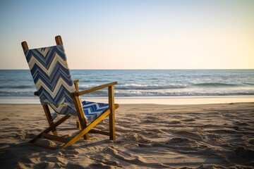 Beach Landscape A beach chair facing the ocean, inviting relaxation and contemplation, wooden frame, blue striped fabric, sunshade, golden sand  2 - AI Generative