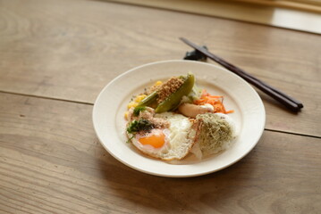 A breakfast plate with some of the most popular Japanese food.