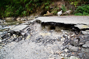 Damaged asphalt road from Flood Damage