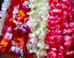 Artificial Flower Garlands hanging on a Rack