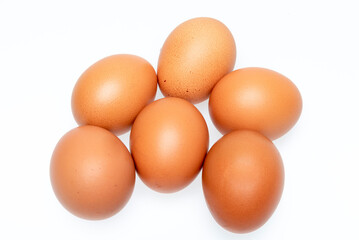 brown chicken egg isolated on white background