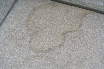 Dirty, stain, blot , fleck of water on the fabric, textile sofa. Dirty textile sofa chemical cleaning Dirty textile sofa chemical cleaning. upholstered furniture cleaning concept