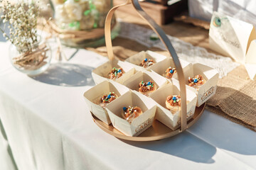 basket with desserts at wedding