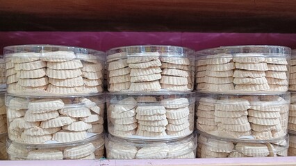 White Cookies from soybean in plastic jars displayed in a cake shop
