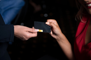 Womens Hand Holding Vip Card Playing in Casino