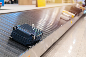 Suitcase or luggage with conveyor belt in the airport
