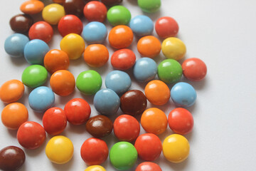 colorfull chocolate candies with white background