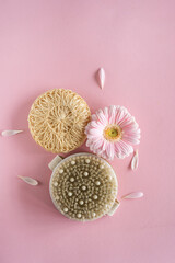 Anti-cellulite cosmetic products. Natural body scrub, cosmetology, peeling, spa products, beauty concept. Natural ingredients for home skin care. Wooden brush for anti-cellulite massage.