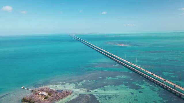 Key West: 7 Mile Bridge, Florida Keys, United States. Aerial view of bridge and islands on the way to Key West, Florida, United States. Great seascape. Viaduct scene. Transportation view.
