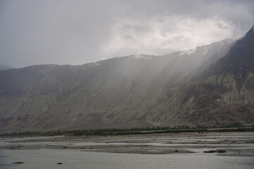 Clouds fly over the top of the mountain, beautiful scenery at Ladakh, India