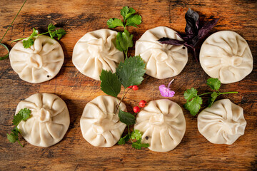 Georgian dumplings khinkali on the wooden table