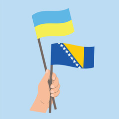 Flags of Ukraine and Bosnia and Herzegovina, Hand Holding flags