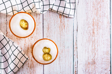 Spicy cocktail with margarita, egg white foam, tagine and jalapeno peppers in glasses top view