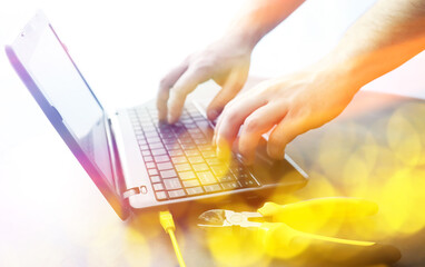 Rainbow IT background. The laptop is connected to the Internet. Community tolerance.